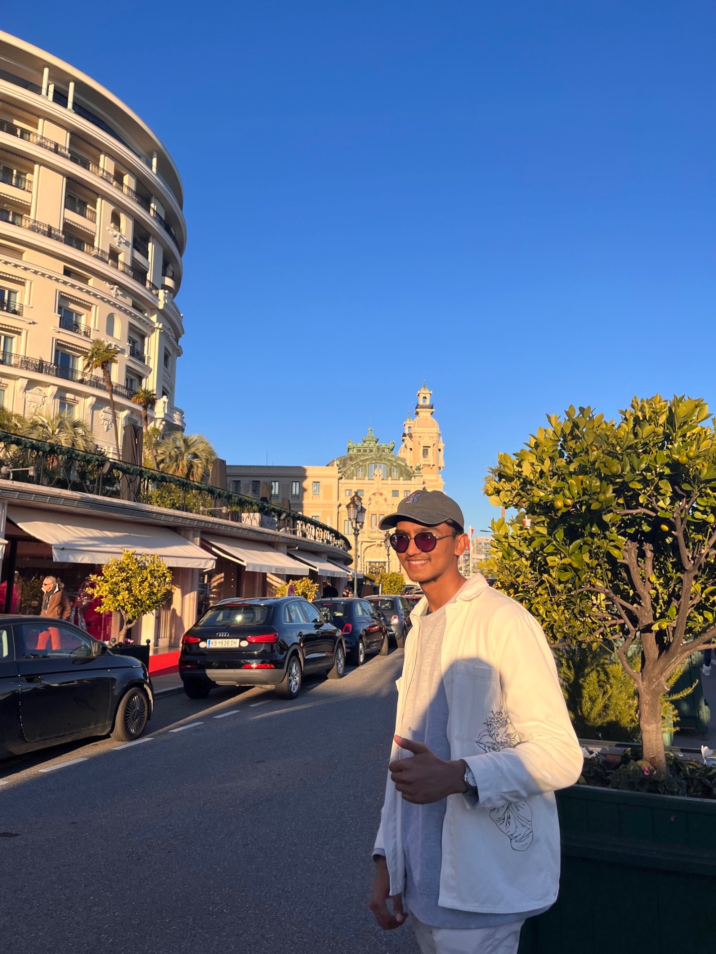 Devam in white in Monaco at golden hour